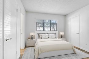 Northridge apartment for rent - a bedroom with a bed and a window
