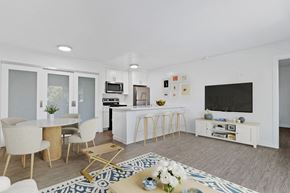 Tarzana apartment for rent - a living room with a kitchen and a table and chairs