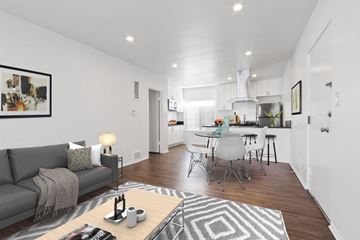 Los Angeles apartment for rent - A modern living room with a grey sofa and a coffee table.