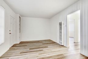 Los Angeles apartment for rent - a bedroom with hardwood floors and white walls