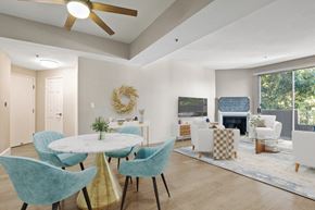 Hancock Park apartment for rent - A dining room with a round table and chairs.