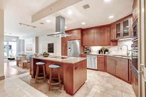Los Angeles apartment for rent - a large kitchen with wooden cabinets and a counter top
