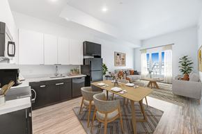 Los Angeles apartment for rent - a living area with a dining table and a kitchen