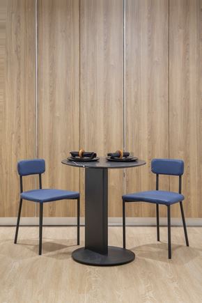 Los Angeles apartment for rent - a black table with two blue chairs around it