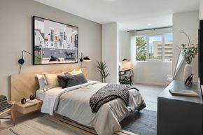 Inglewood apartment for rent - a bedroom with a bed and a window