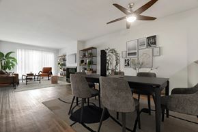 Los Angeles apartment for rent - A modern dining room with a table set for four and a ceiling fan.