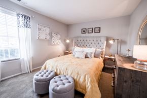 Indianapolis apartment for rent - Bedroom with a window and neutral colored walls at Chelsea Village Apartments