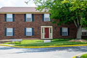 Vincennes apartment for rent - A red door is on the front of a brick building.