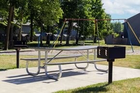 Indianapolis apartment for rent - Playground with grilling stations at Woodlake Apartments