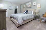 Lorton apartment for rent - Spacious master bedroom, featuring furnishings at The Woods of Fairfax Apartments, Lorton