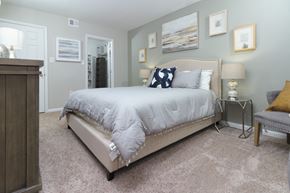 Lorton apartment for rent - Spacious master bedroom, featuring furnishings at The Woods of Fairfax Apartments, Lorton