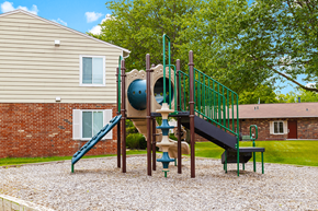 Bluffton apartment for rent - Playground with a slide and playset at  Capri Meadows Apartments.