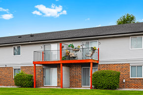 Shelbyville apartment for rent - Exterior view of Blueridge Terrace Apartments, featuring balconies and patios on upper and lower levels.