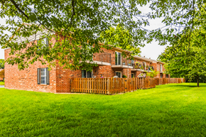 Muncie apartment for rent - Building exterior with balconies and patios at Carriage House Apartments, Muncie, IN