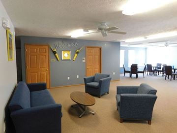 West Lafayette apartment for rent - a living room with couches and chairs and a table