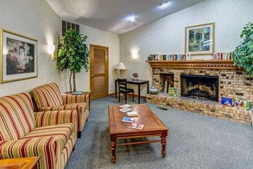 Indianapolis apartment for rent - a living room with couches and a fireplace
