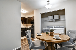 Indianapolis apartment for rent - Dining room with in-unit laundry in a 1-bed, 1-bath apartment at Ashton Brook, featuring a functional space.