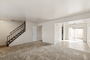 Kendallville apartment for rent - Living and dining area in a 2-bed, 1.5-bath townhome at Carriage House Apartments, Kendallville, featuring an open layout and natural light.