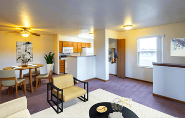 Lafayette apartment for rent - A living room with a dining table and chairs.