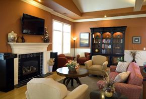 Noblesville apartment for rent - Spacious lounge area at Meredith Meadows Apartments featuring stylish seating and natural lighting.