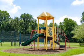 Mishawaka apartment for rent - a playground with a slide and a pavilion