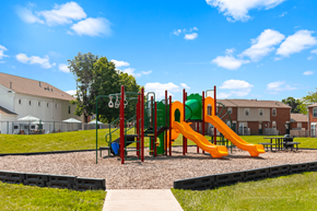 Indianapolis apartment for rent - Playground at Windsor Park Apartments, featuring colorful play equipment for children to enjoy.