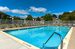 Elkhart apartment for rent - Swimming pool with seating at North Lake Apartments.