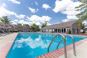 Indianapolis apartment for rent - Outdoor swimming pool with seating at Woodbridge Apartments