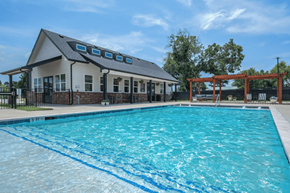 Athens apartment for rent - A swimming pool at Flat Creek Apartments s with a black fence.