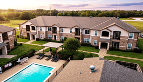 Sulphur Springs apartment for rent - A large apartment complex with a pool and a hot tub.