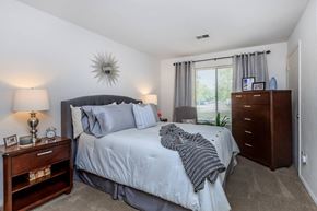Roanoke apartment for rent - a bedroom with a bed and a window