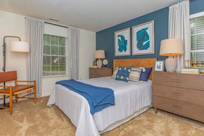 Avon apartment for rent - a bedroom with a bed and a dresser