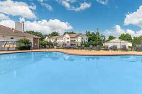 Cuyahoga Falls apartment for rent - A swimming pool in front of a residential area.