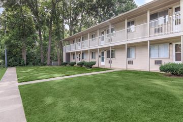 Stow apartment for rent - our apartments have a spacious yard with green grass and trees