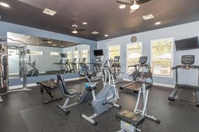 Avon apartment for rent - a gym with cardio machines and other exercise equipments and windows