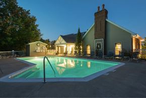 Medina townhouse for rent - A house with a pool in front of it.