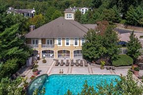Watchung apartment for rent - arial view of a large mansion with a swimming pool