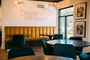 Troy apartment for rent - A dining room with a round table and chairs.