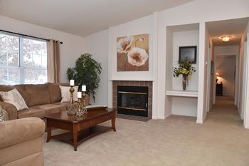 Gas log fireplace with ceramic hearth