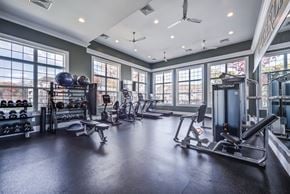 Mechanicsburg townhouse for rent - A spacious gym with a variety of equipment and a ceiling fan at Meridian West Shore, Pennsylvania