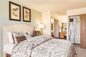 Brookfield apartment for rent - a bedroom with a bed and a bathroom with a sink