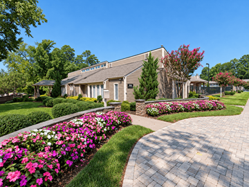 Henrico apartment for rent - A house with a garden in front of it.