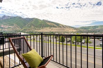 Balcony seating with mountain valley views
