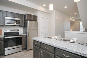 Draper apartment for rent - Modern kitchen with granite countertops at Liberty Point Apartments, Utah