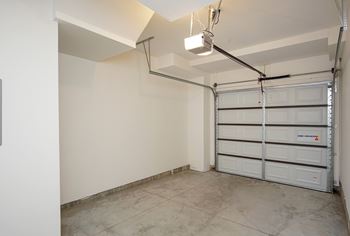 Garage space with overhead door opener