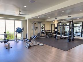 Salt Lake City apartment for rent - A spacious home gym with a variety of equipment.