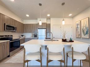 Park City apartment for rent - Liberty Sage Apartments, Park City, Utah, a modern kitchen with a large island and bar seating.