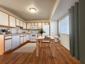 Draper townhouse for rent - Liberty Hill Apartments, Draper, Utah, kitchen with wooden floors and white appliances.