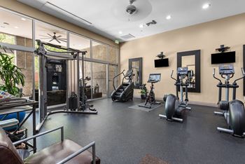 24-Hour fitness center with cardio & weight equipment