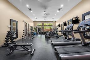 Salt Lake City apartment for rent - Fitness center with cardio equipment and free weights at Liberty Gateway Apartments, Salt Lake City